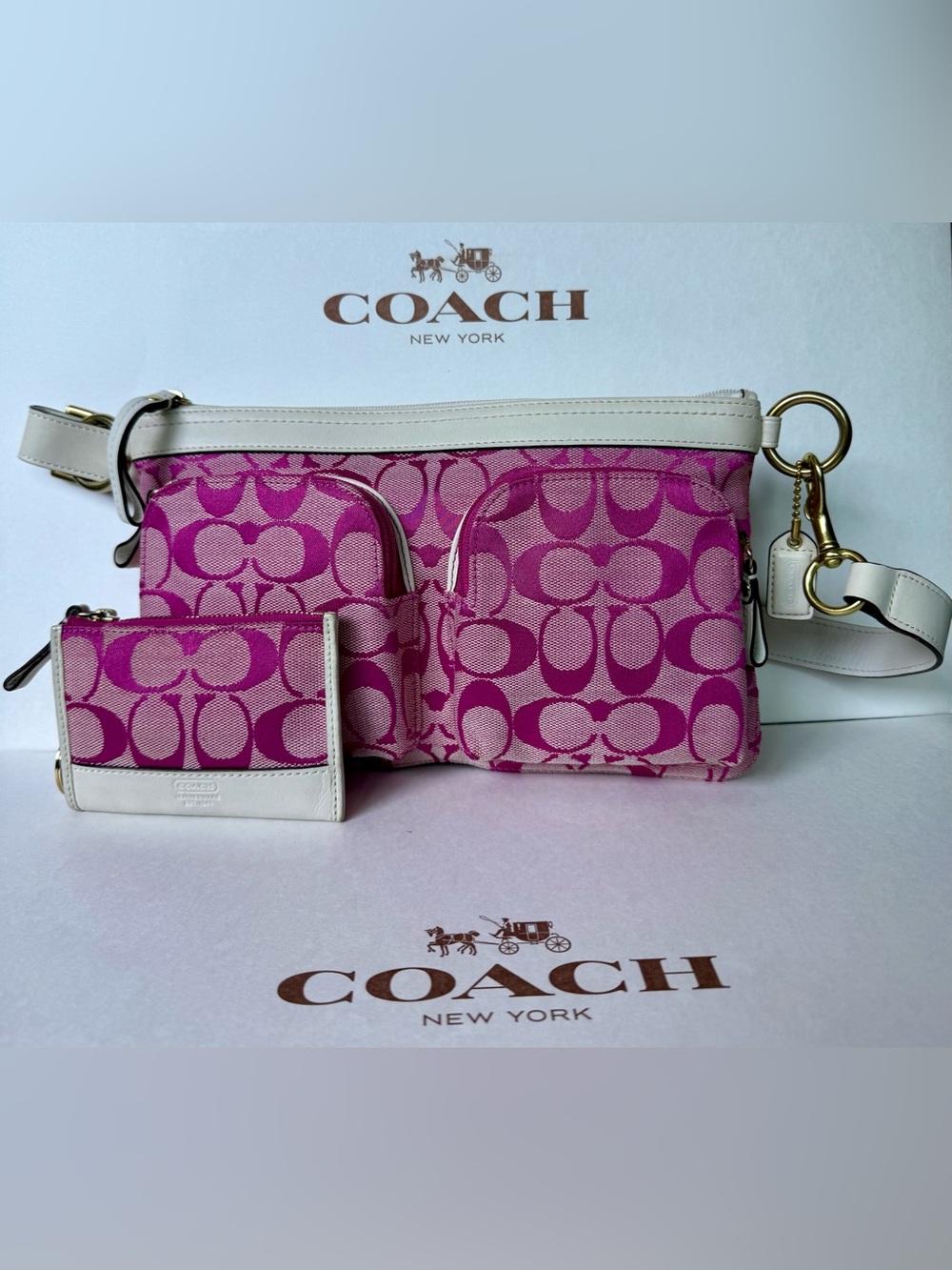 Coach pink signature shoulder bag w/white leather and card ID.